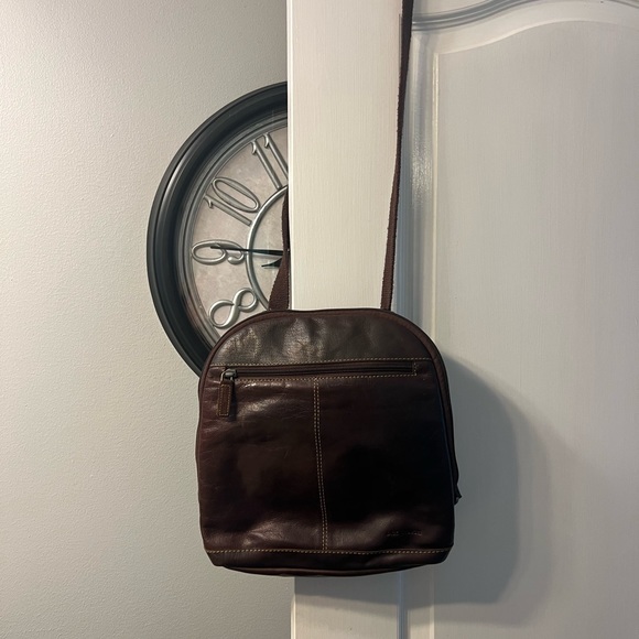 Jack George’s brown leather back pack